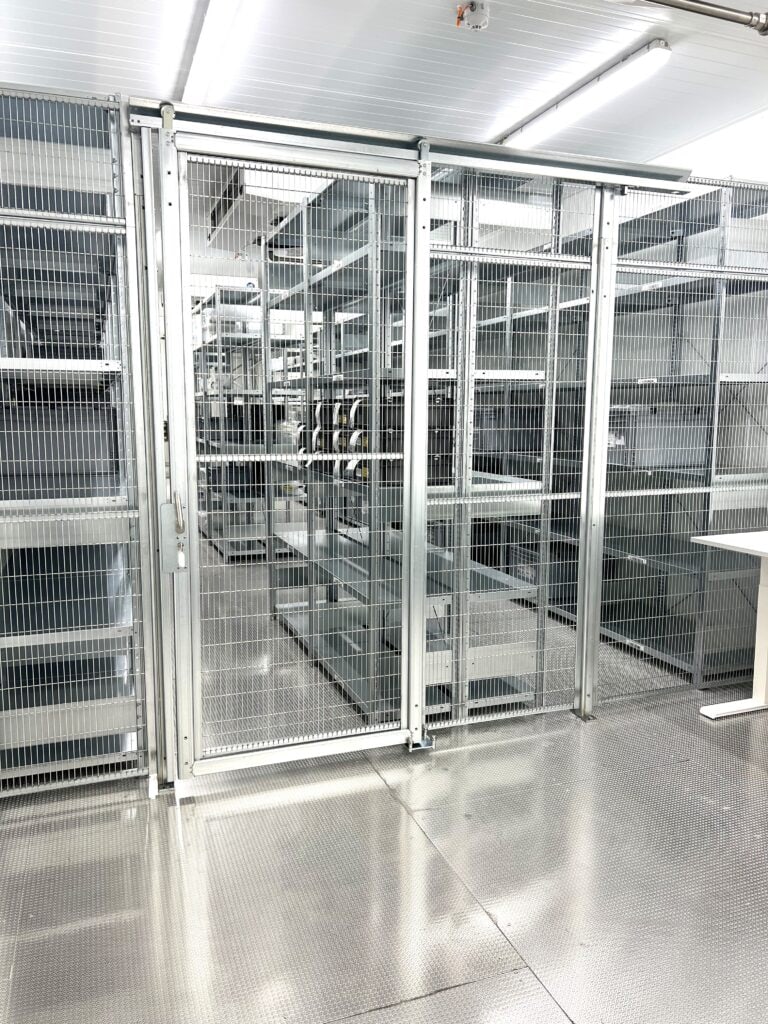 Storage compartment, enclosed in a cage.